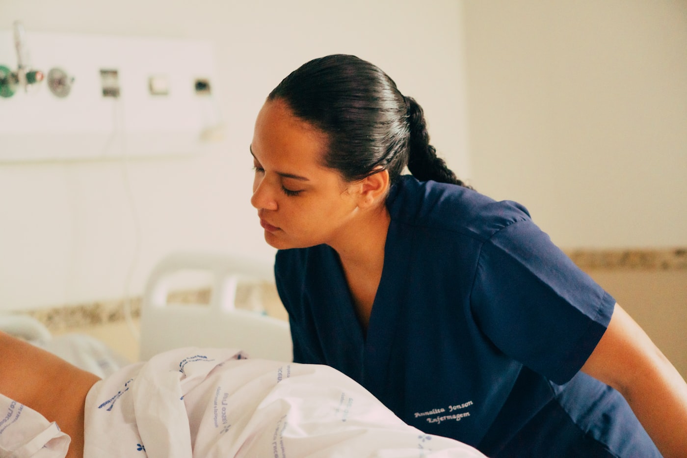 Nurse attending to a patient as part of chronic care