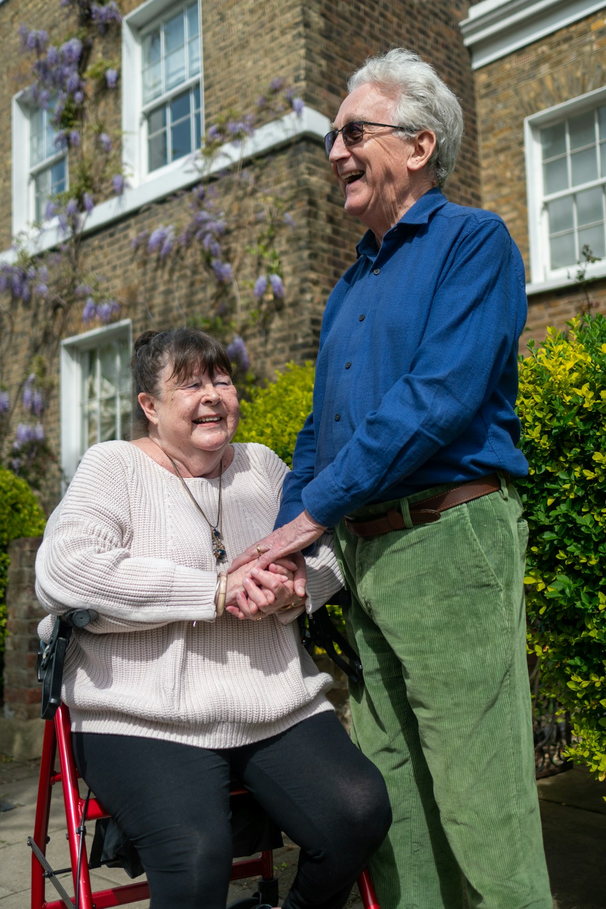 A caregiver spending time with an older adult